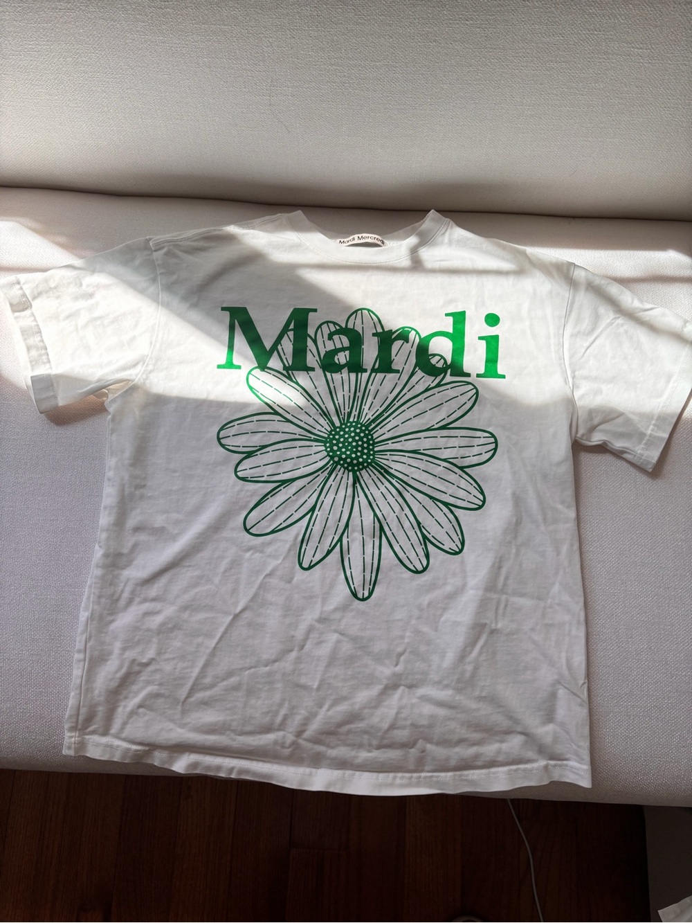 White Short-Sleeve Tee with Green Daisy Print